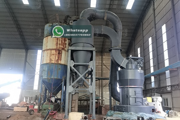 Cement clinker being fed into a grinding mill at a cement plant in Pakistan